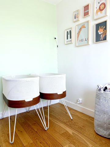 Two SNOO bassinets in a twins' nursery