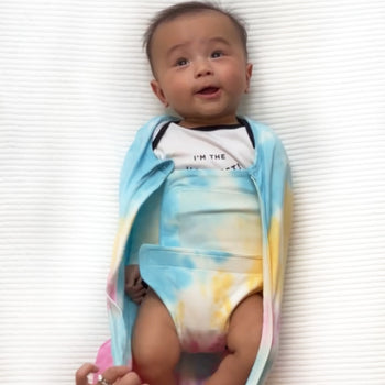 Baby in unzipped Rainbow Tie-Dye Sleepea