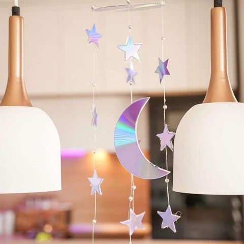 Star and moon nursery mobile made from upcycled CDs